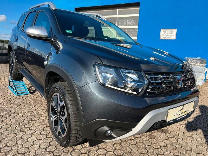 Grau Gebraucht 2021 Dacia Duster Prestige SUV | 16.490 € (Fairer Preis) - Bild 1/4