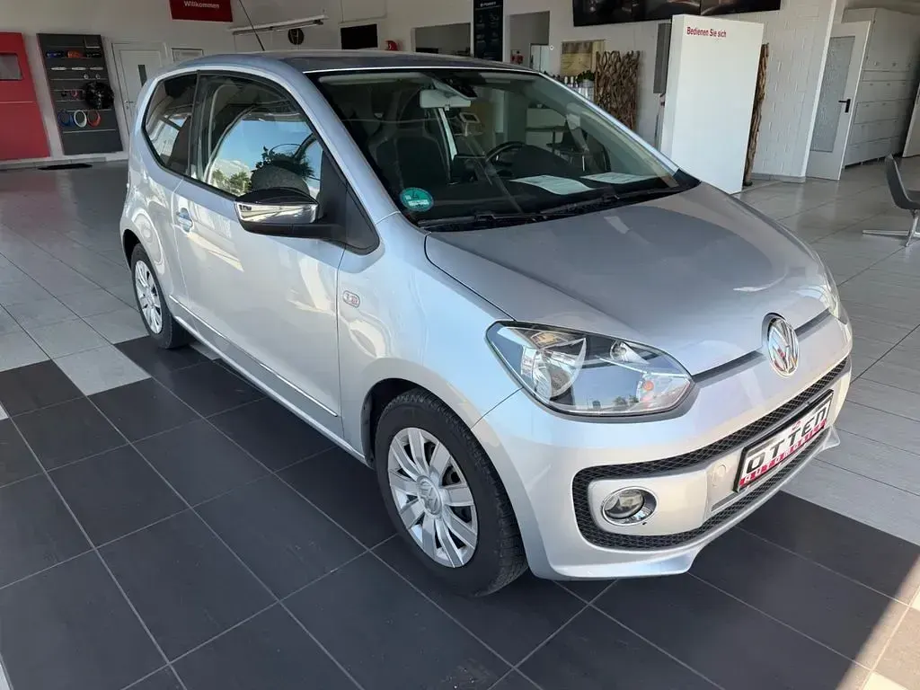 Usado VW up! high up! 75 CV (55 kW) 2012 Plateado Utilitario
