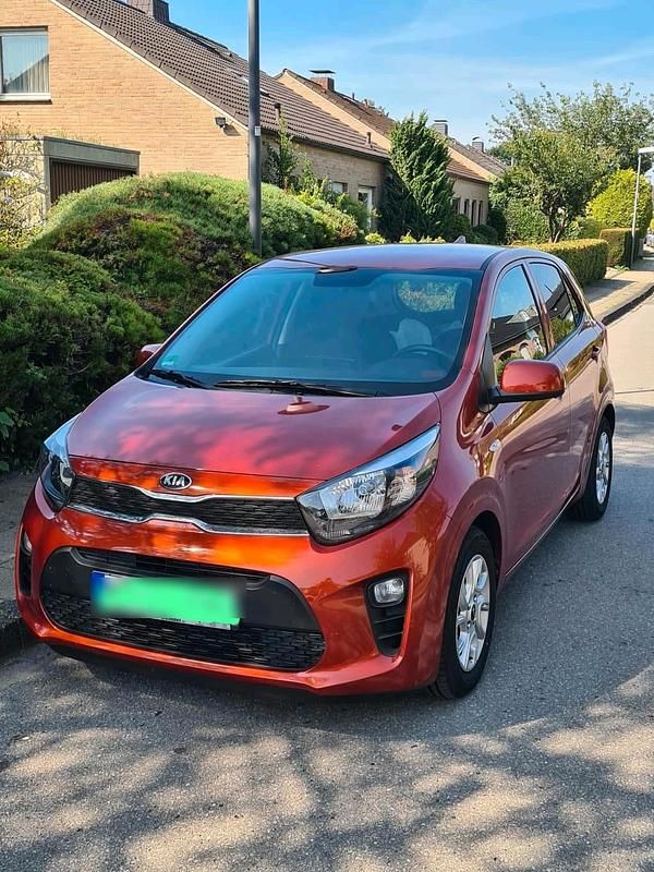 Orange Gebraucht 2019 Kia Picanto DREAM-TEAM Edition Kleinwagen | 8.950 € (Fairer Preis) - Bild 1/4