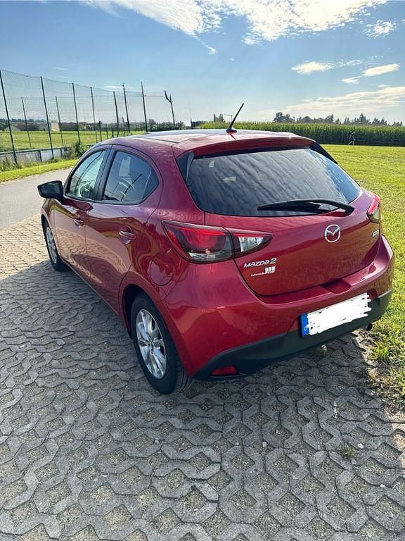 Gebraucht Mazda 2 Exclusive-Line 90 PS (66 kW) 2015 Rot Limousine