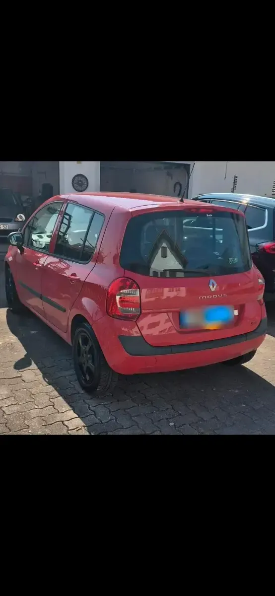 Używany Renault Modus 85 KM (62 kW) 2011 Czerwony Minivan