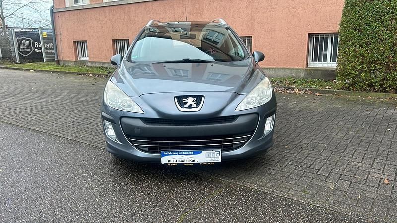 Grau Gebraucht 2010 Peugeot 308 SW Premium Kombi | 3.750 € - Bild 1/4