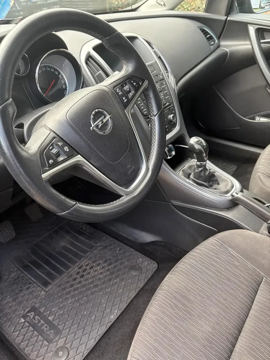 Używany Opel Astra 110 KM (80 kW) 2015 Czarny Kombi