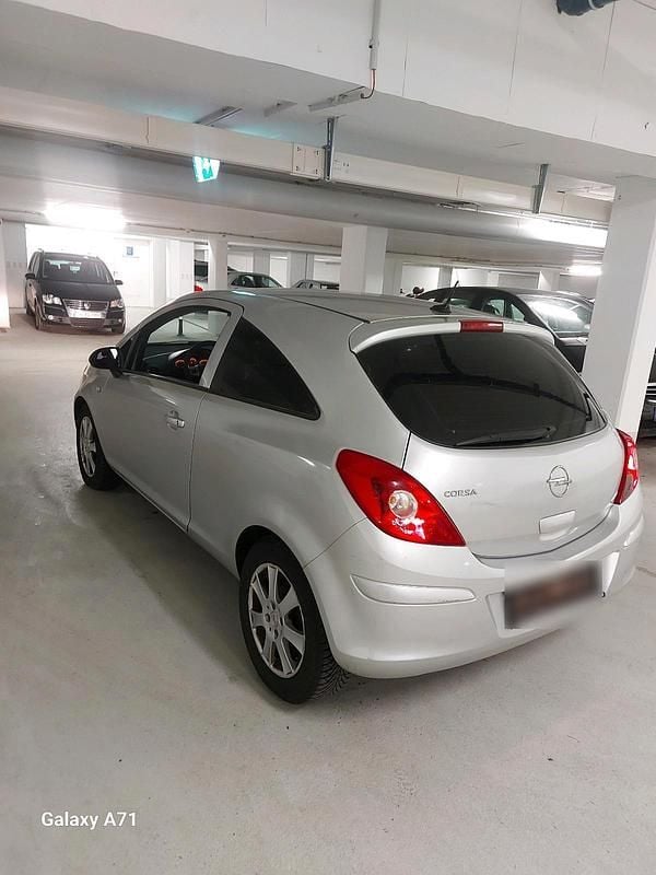 Second-hand Opel Corsa 80 CP (58 kW) 2009 Argintiu Hatchback