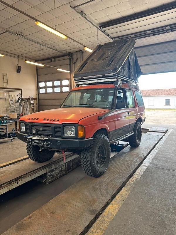 Orange Gebraucht 1991 Land Rover Discovery SUV | 15.200 € - Bild 1/4