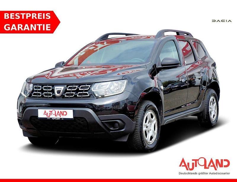 Perlmuttschwarzmet. (metallic) Gebraucht 2021 Dacia Duster SUV | 15.990 € (Fairer Preis) - Bild 1/4