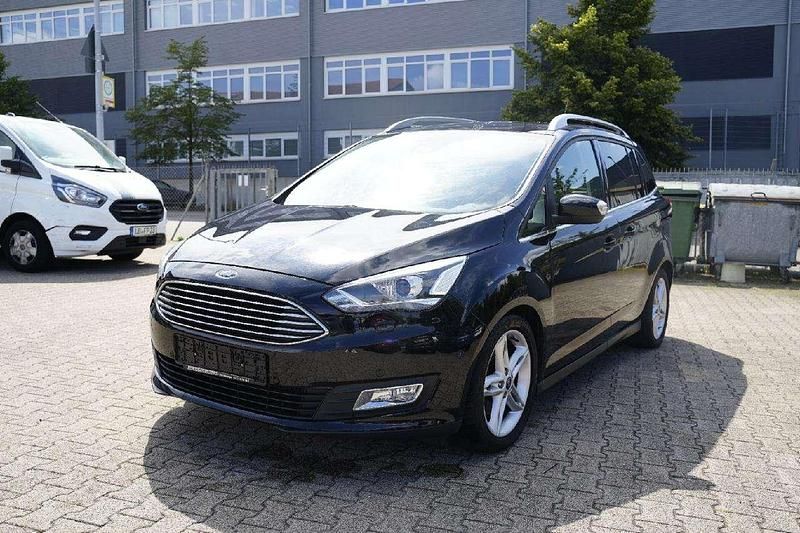 Iridiumschwarz metallic Gebraucht 2019 Ford Grand C-Max Titanium Van / Kleinbus | 16.490 € (Fairer Preis) - Bild 1/4
