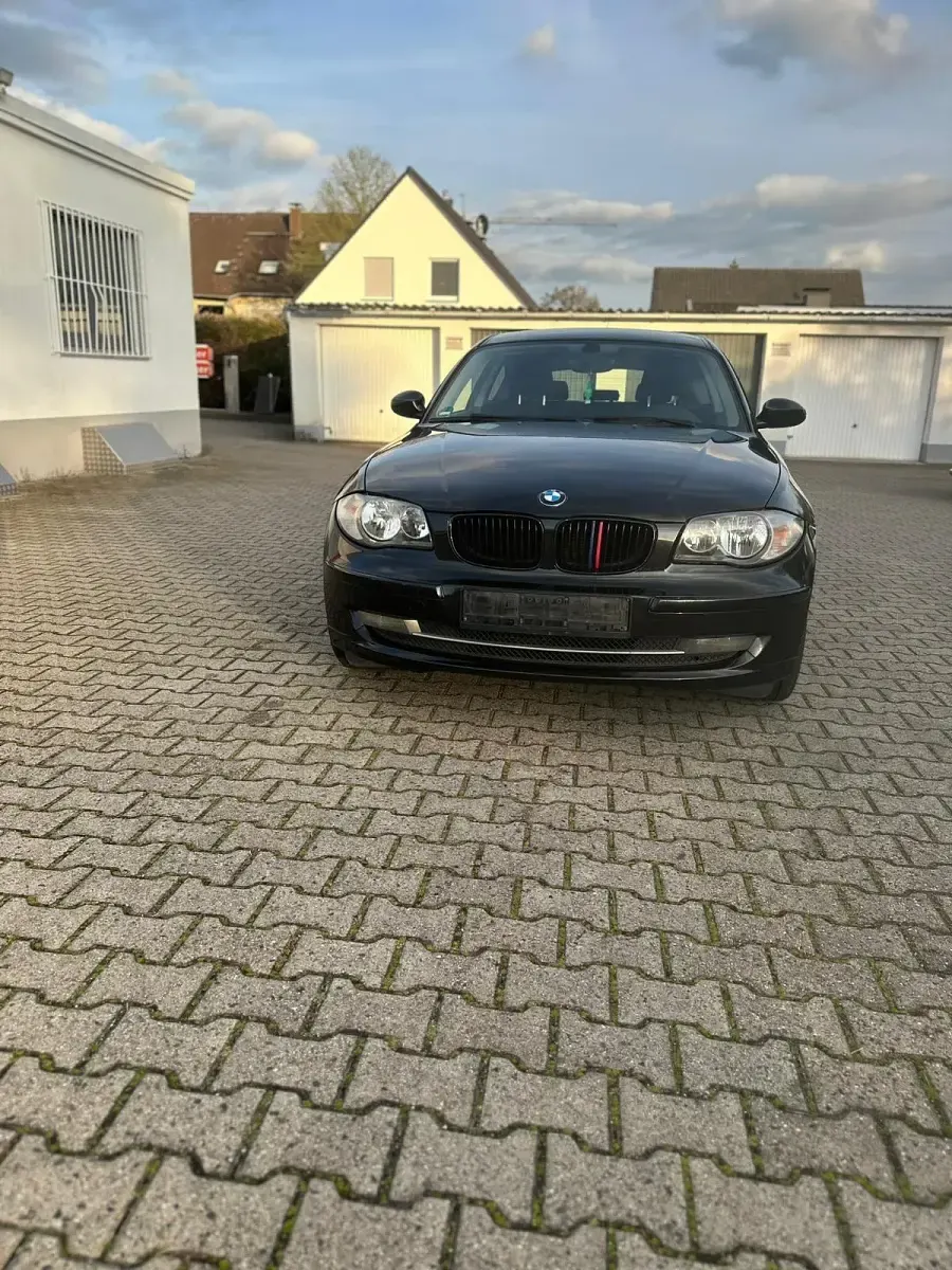 Gebraucht BMW 116 116 PS (85 kW) 2010 Schwarz Kleinwagen