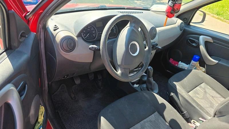 Second-hand Dacia Sandero 75 CP (55 kW) 2009 Roșu Berlinǎ