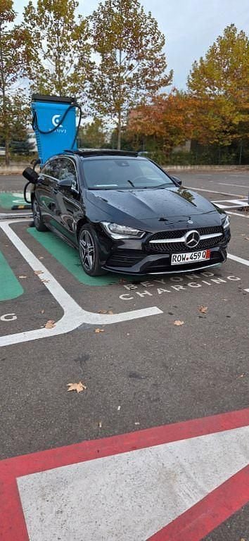 Schwarz Gebraucht 2021 Mercedes CLA250e AMG line Limousine | 23.990 € (Superpreis) - Bild 1/4