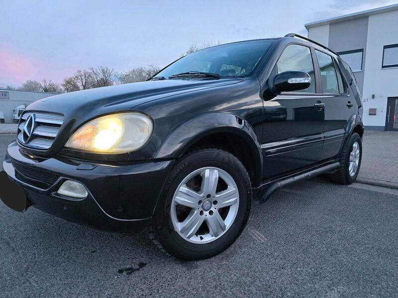 Schwarz Gebraucht 2004 Mercedes ML400 SUV | 4.499 € - Bild 1/4