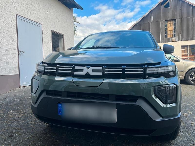 Grün Neu 2025 Dacia Spring Kleinwagen | 13.500 € (Superpreis) - Bild 1/4