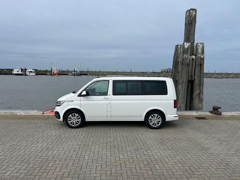 Second-hand VW Multivan Generation Six 150 CP (110 kW) 2020 Alb Monovolum