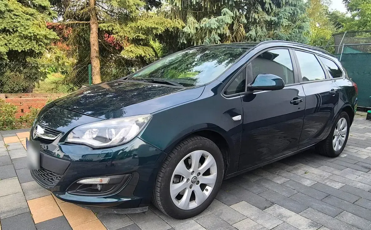 Gebraucht Opel Astra 120 PS (88 kW) 2015 Grün Kombi