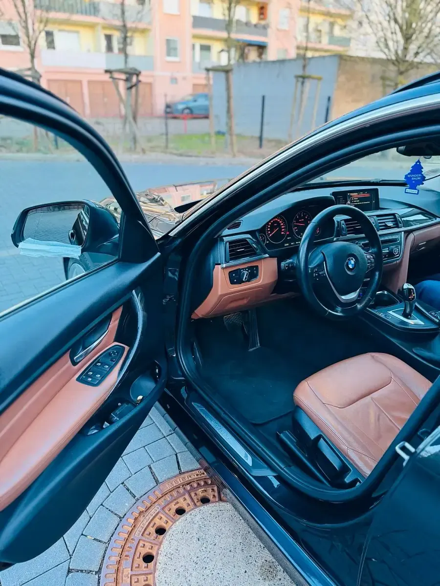 Second-hand BMW 330 258 CP (189 kW) 2015 Negru Break