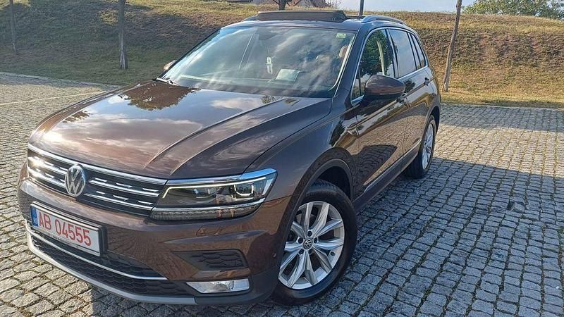 Braun Gebraucht 2016 VW Tiguan Highline SUV | 20.790 € - Bild 1/4