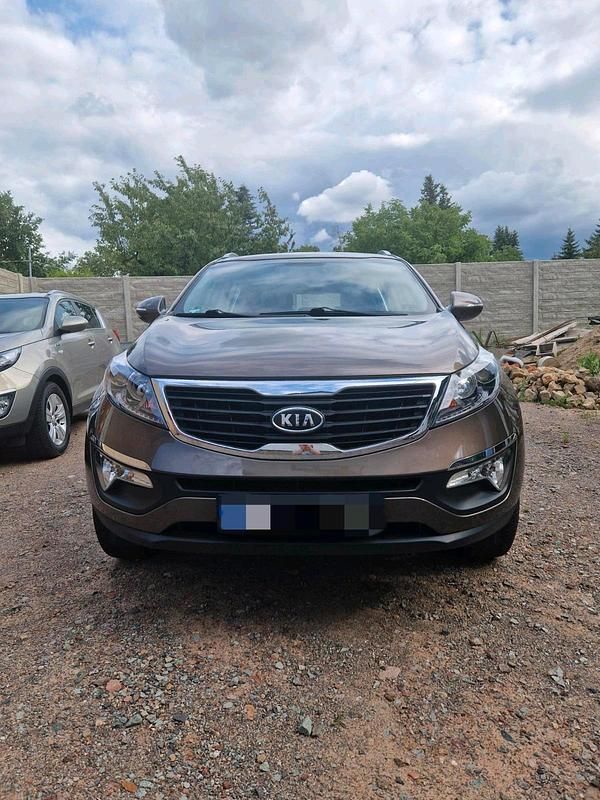 Braun Gebraucht 2011 Kia Sportage SUV | 8.500 € - Bild 1/4