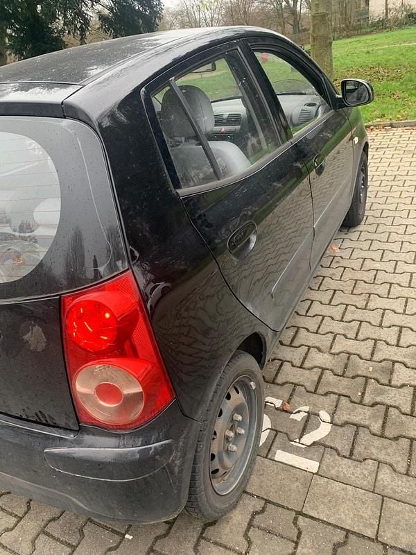 Second-hand Kia Picanto 65 CP (47 kW) 2011 Negru Hatchback