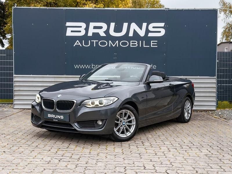 Grau Gebraucht 2016 BMW 218 Advantage Cabrio | 16.490 € (Fairer Preis) - Bild 1/4