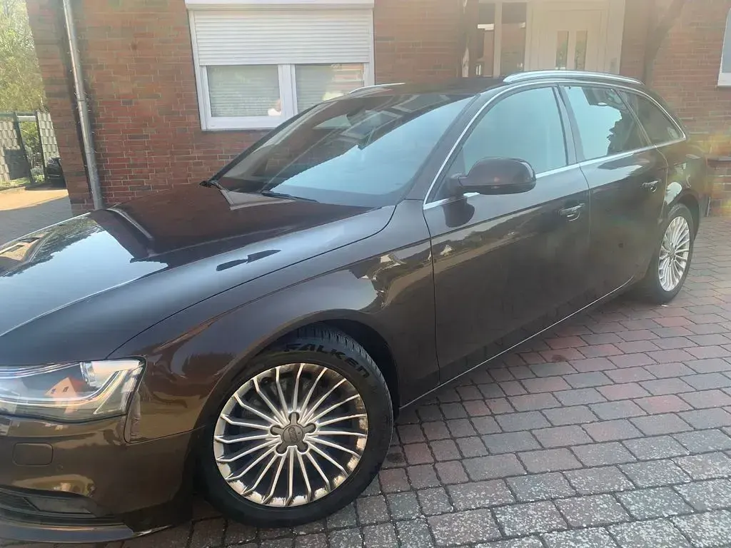 Używany Audi A4 Ambition 150 KM (110 kW) 2014 Brązowy Kombi