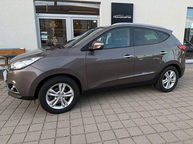 Braun Gebraucht 2012 Hyundai ix35 Premium SUV | 9.490 € (Fairer Preis) - Bild 1/4
