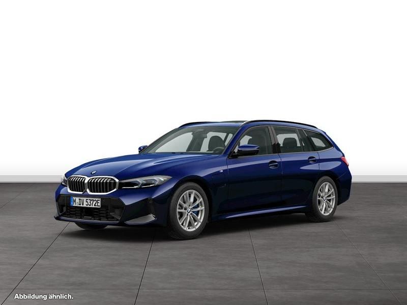 Blau Gebraucht 2024 BMW 330e Kombi | 55.190 € - Bild 1/4