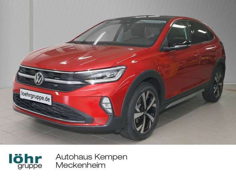 Kings red metallic Gebraucht 2024 VW Taigo Style SUV | 28.620 € (Teuer) - Bild 1/4