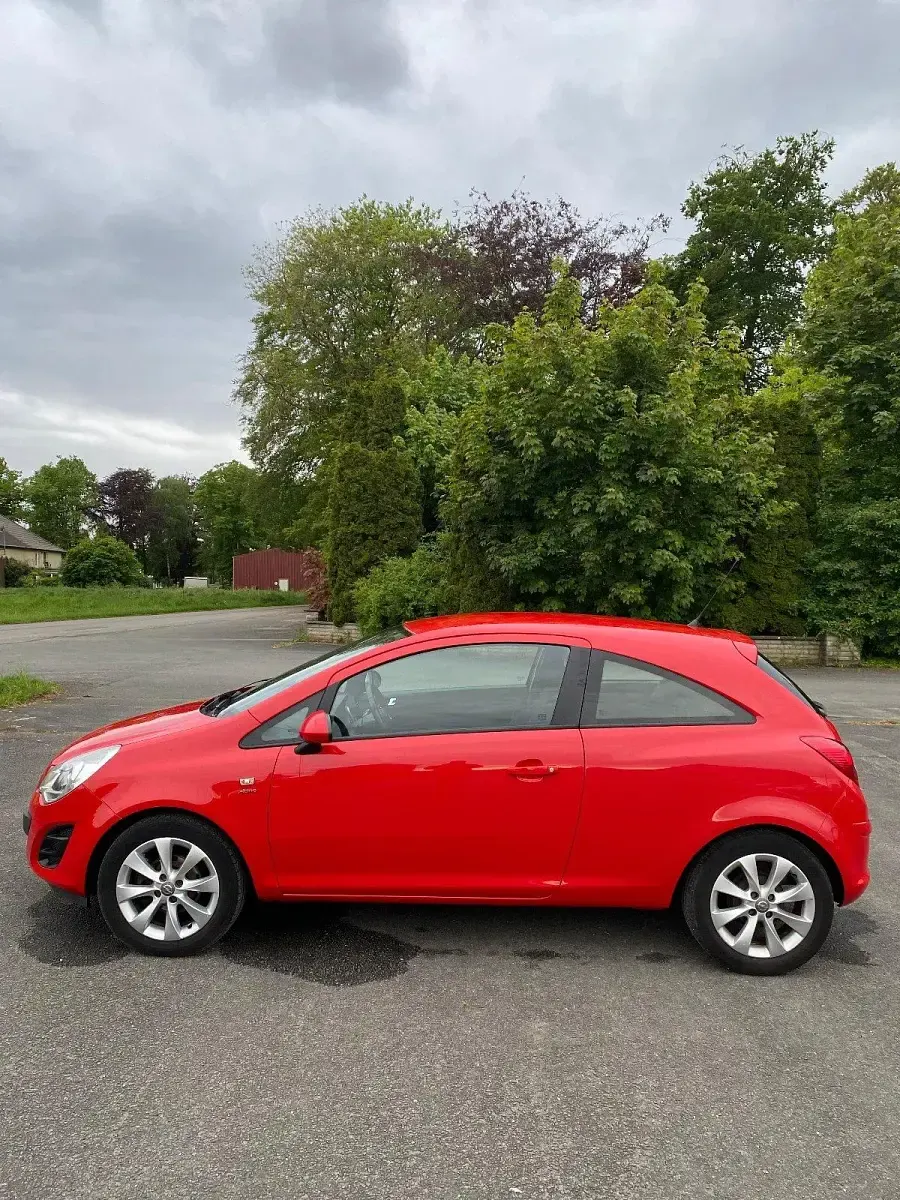Gebraucht Opel Corsa Active 69 PS (50 kW) 2013 Rot Kleinwagen