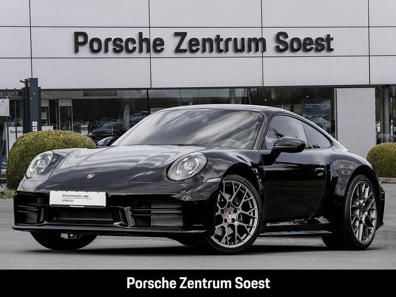 Schwarz Gebraucht 2025 Porsche 911 Carrera Coupé | 135.887 € (Superpreis) - Bild 1/4