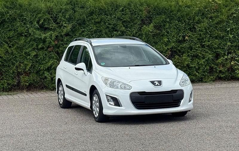 Weiß Gebraucht 2011 Peugeot 308 Access Kombi | 3.499 € (Fairer Preis) - Bild 1/4
