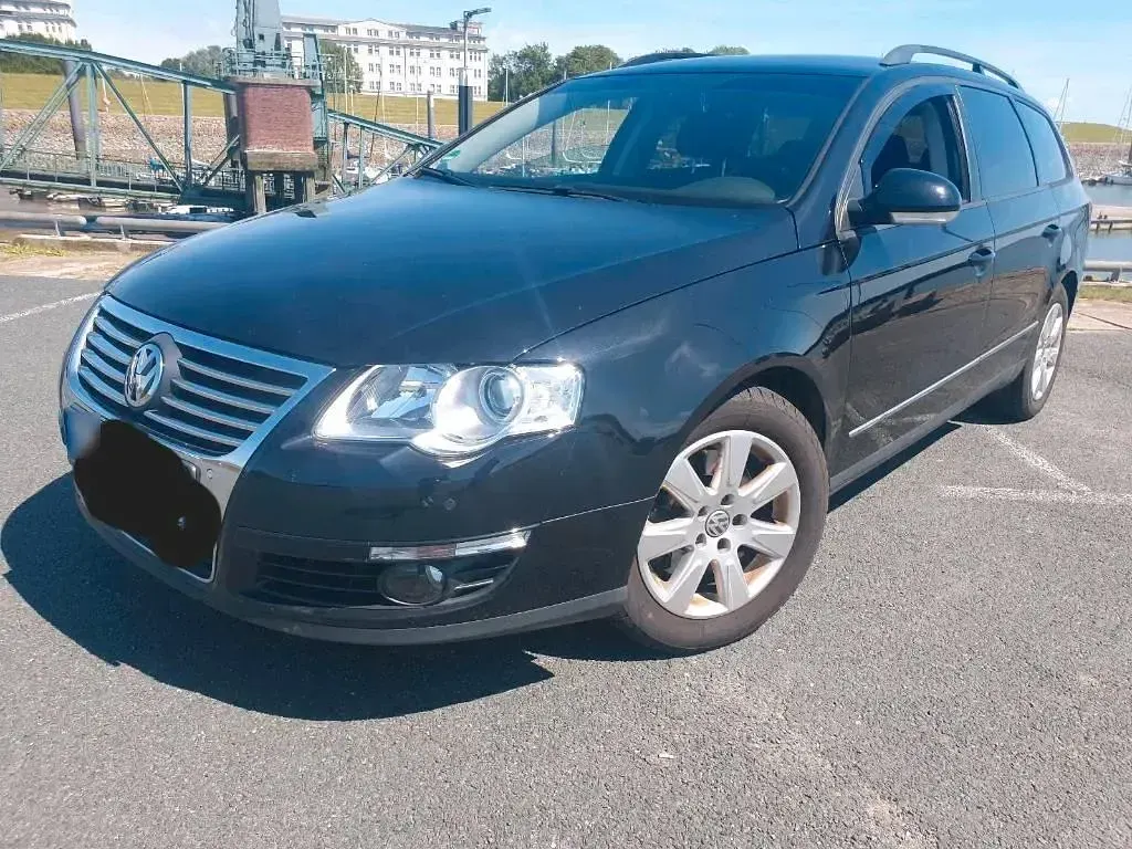 Second-hand VW Passat Sportline 160 CP (117 kW) 2009 Negru Break