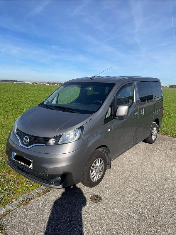 Grau Gebraucht 2012 Nissan NV200 Van / Kleinbus | 10.000 € (Etwas zu teuer) - Bild 1/4