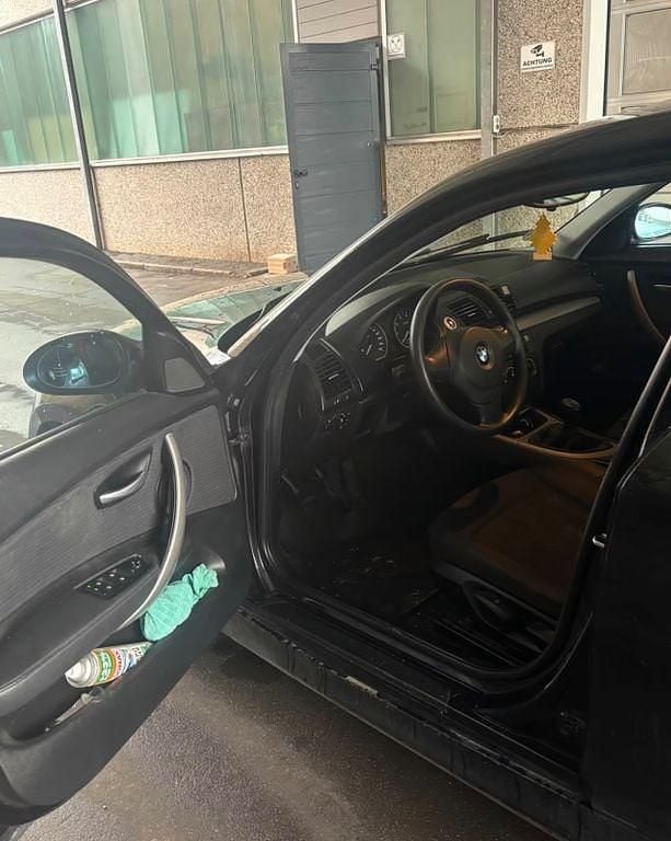 Gebraucht BMW 116 122 PS (89 kW) 2008 Schwarz Kleinwagen