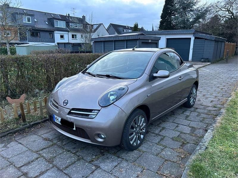 Braun Gebraucht 2005 Nissan Micra C+C Premium Edition Cabrio | 1.950 € (Fairer Preis) - Bild 1/4