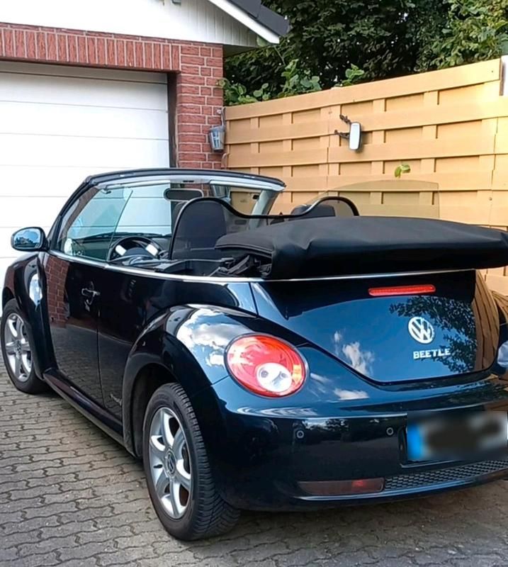 Gebraucht VW New Beetle 102 PS (75 kW) 2010 Schwarz Kleinwagen