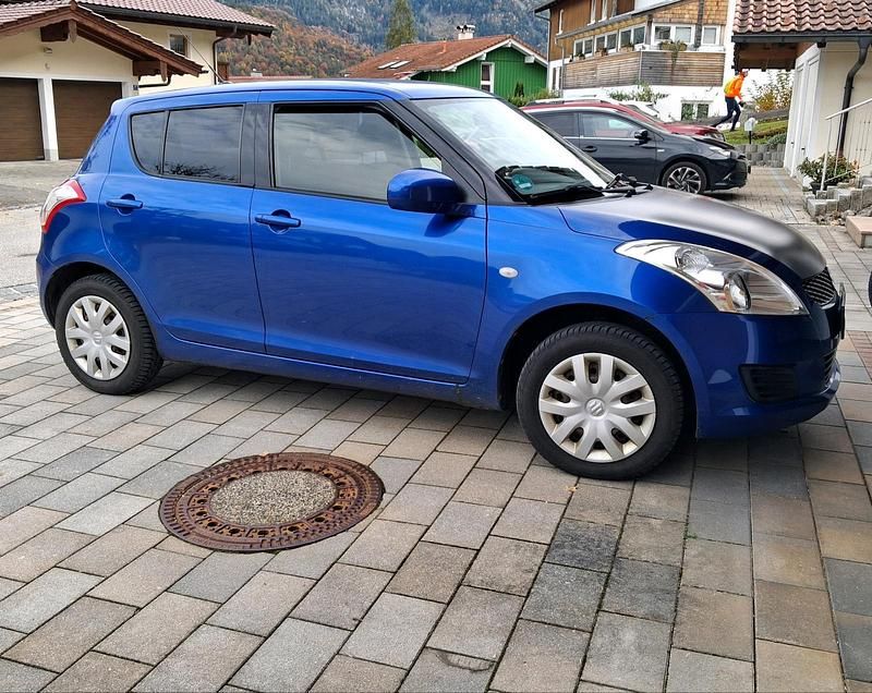 Blau Gebraucht 2013 Suzuki Swift Kleinwagen | 5.900 € (Fairer Preis) - Bild 1/4