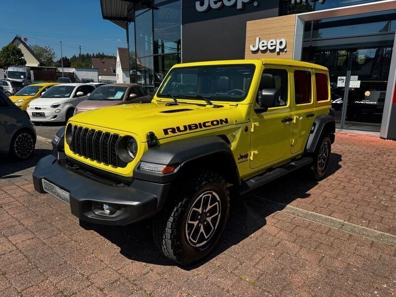 Gelb Gebraucht 2024 Jeep Wrangler Rubicon SUV | 58.280 € (Superpreis) - Bild 1/4