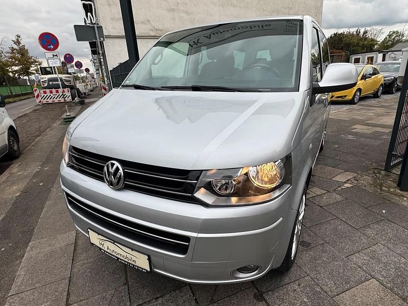 Silber Gebraucht 2014 VW Multivan Highline Van | 21.590 € (Superpreis) - Bild 1/4