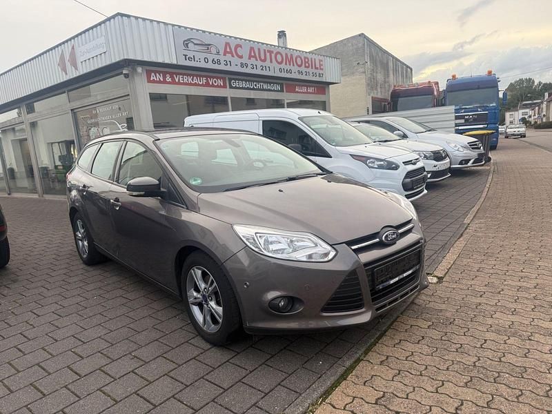 Braun Gebraucht 2012 Ford Focus Champions Edition Kombi | 2.499 € (Superpreis) - Bild 1/4