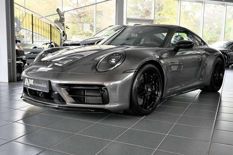 Achatgrau Gebraucht 2024 Porsche 911 Carrera 4 GTS Coupé | 159.800 € (Guter Preis) - Bild 1/4