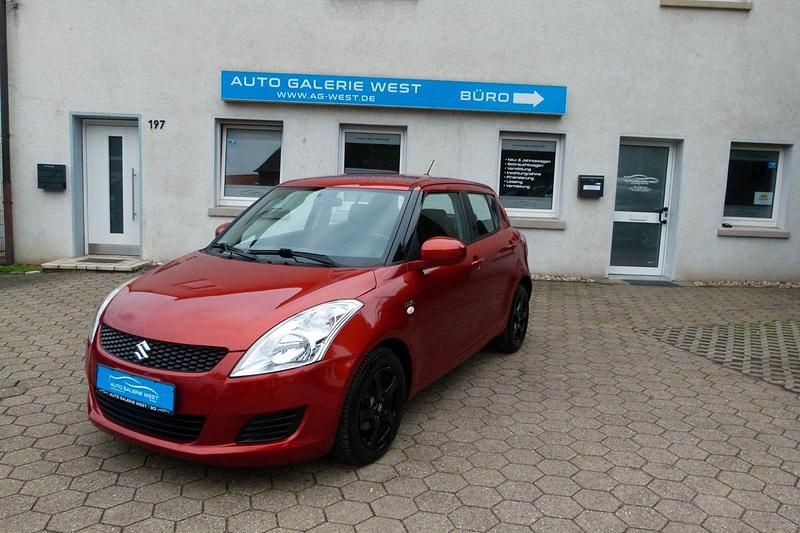 Orange Gebraucht 2014 Suzuki Swift Comfort Kleinwagen | 5.490 € (Fairer Preis) - Bild 1/4