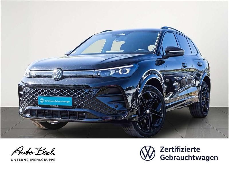 Schwarz (grenadillschwarz metallic) Gebraucht 2025 VW Tiguan R-line SUV | 55.980 € (Teuer) - Bild 1/4