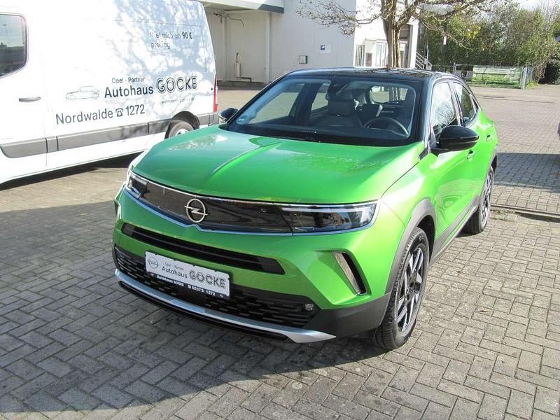 Gebraucht Opel Mokka Elegance 131 PS (96 kW) 2021 Matcha green/ikone gruen SUV
