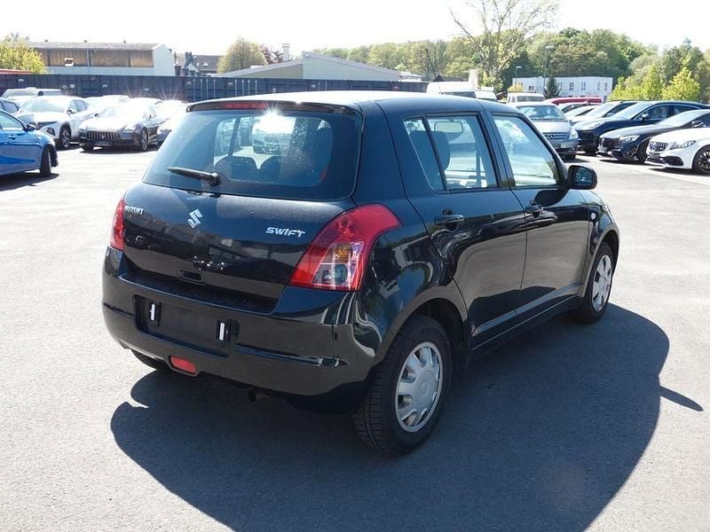 Second-hand Suzuki Swift 92 CP (67 kW) 2010 Negru Hatchback