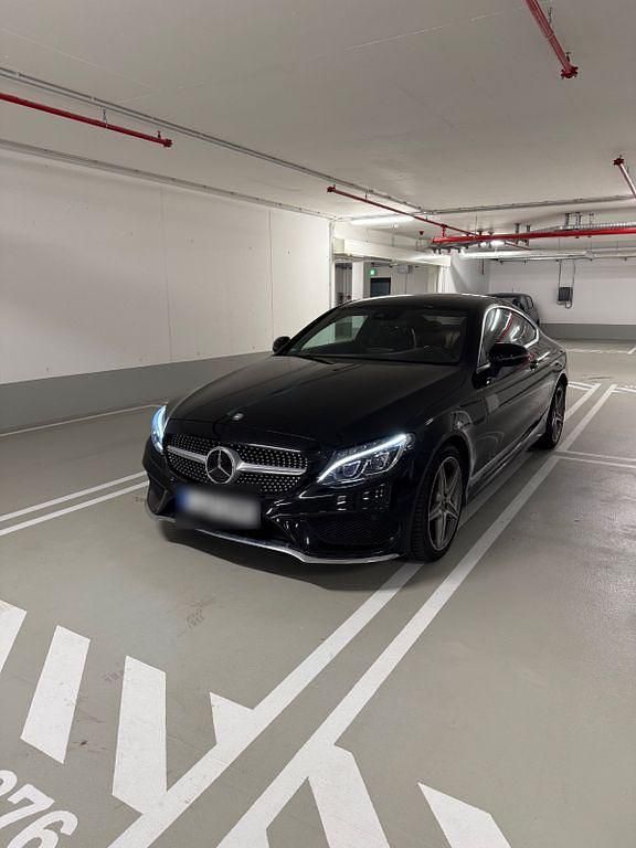Schwarz Gebraucht 2017 Mercedes C220 AMG line Coupé | 24.500 € (Etwas zu teuer) - Bild 1/4