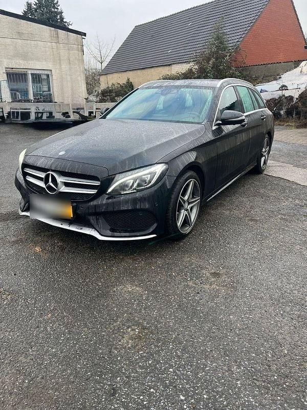 Schwarz Gebraucht 2015 Mercedes C200 AMG line Kombi | 18.800 € (Teuer) - Bild 1/4