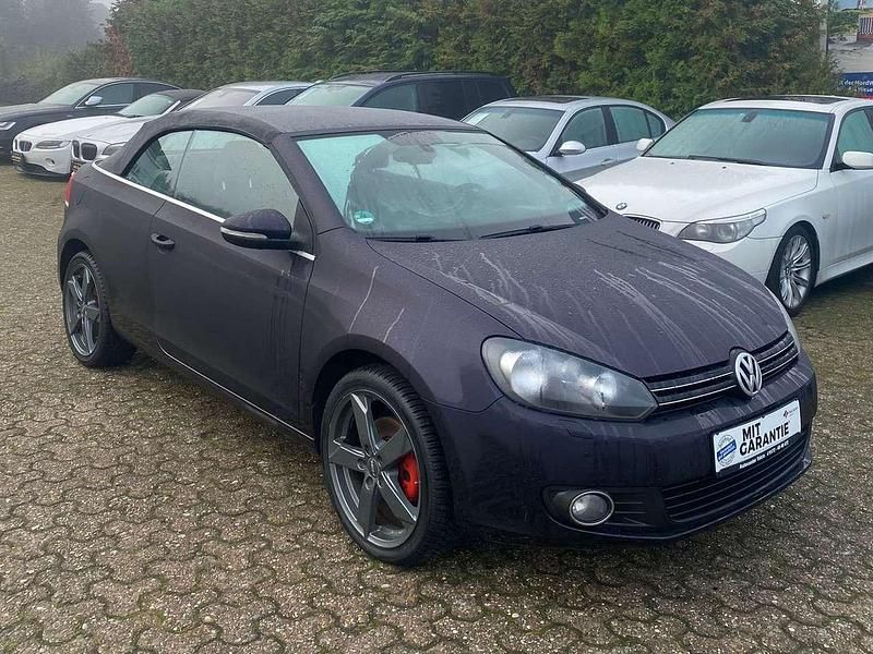Gebraucht VW Golf Cabriolet Basis 105 PS (77 kW) 2011 Dark purple metallic Cabrio