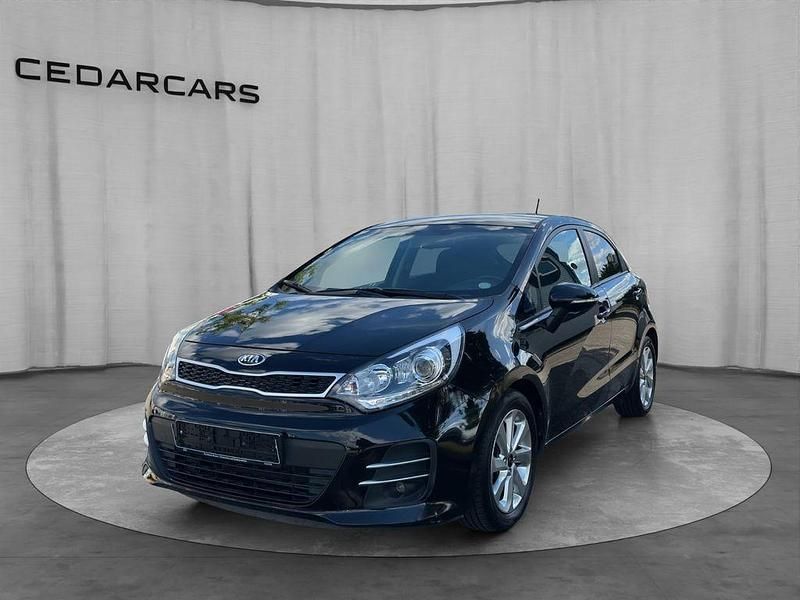 Schwarz Gebraucht 2015 Kia Rio 3 Limousine | 12.499 € (Teuer) - Bild 1/4