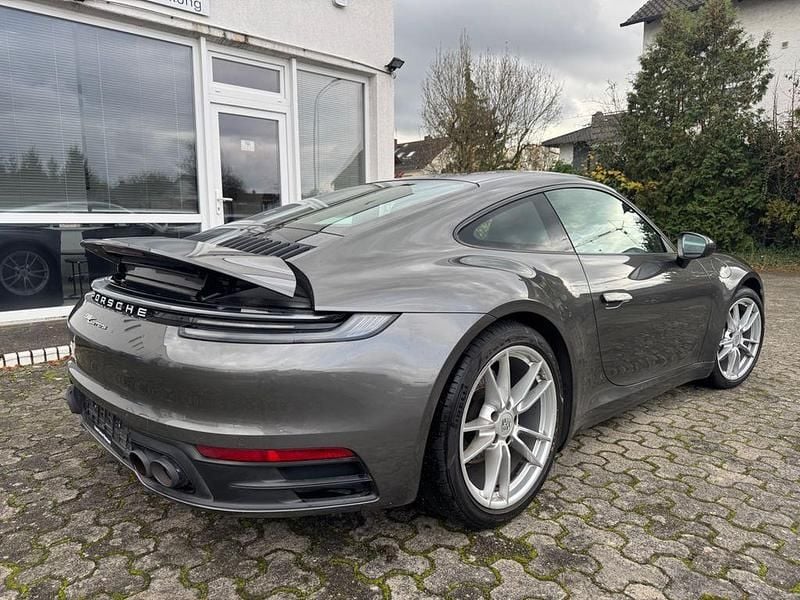 Achatgrau Gebraucht 2024 Porsche 992 Coupé | 103.990 € (Fairer Preis) - Bild 1/4