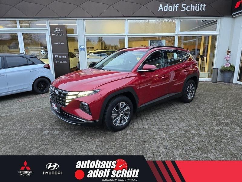 Sunset red Gebraucht 2021 Hyundai Tucson Trend SUV | 20.990 € (Fairer Preis) - Bild 1/4